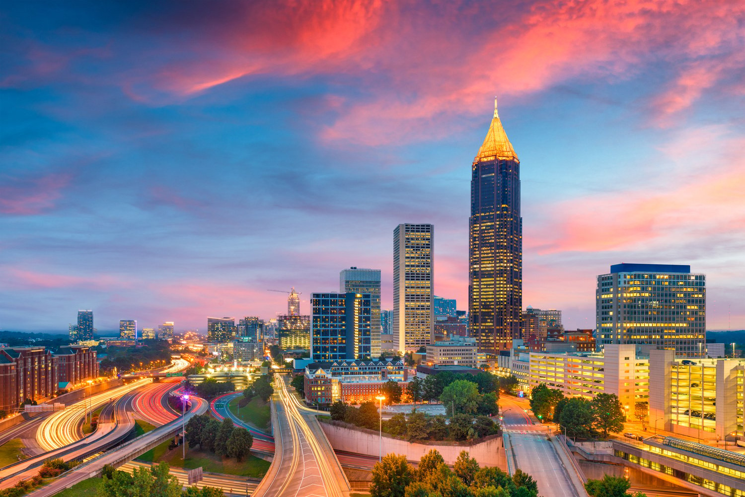 Atlanta, Georgia, USA downtown and midtown skyline at dusk.